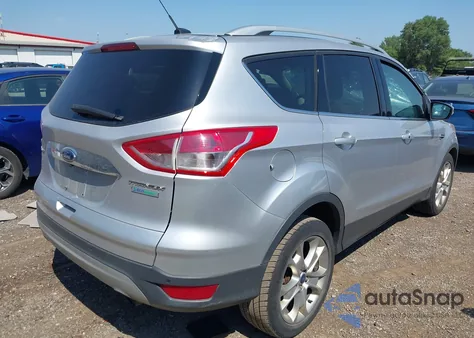 2015 Ford Escape Titanium z USA, uszkodzony, nr VIN 1FMCU0JX3FUC58099